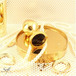 Plug bijou doré avec un bijou en cristal noir