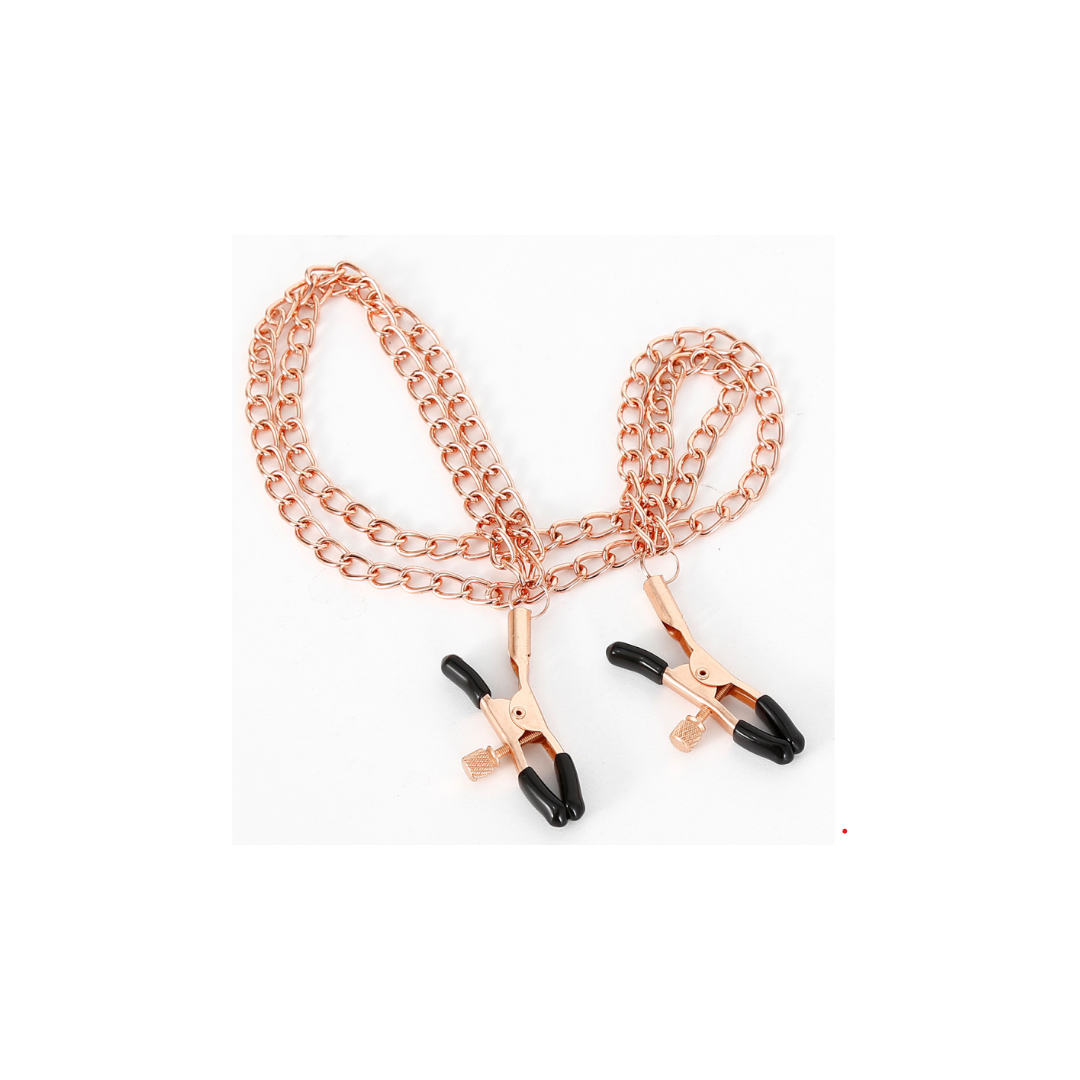 Pinces à seins or rose avec chaines